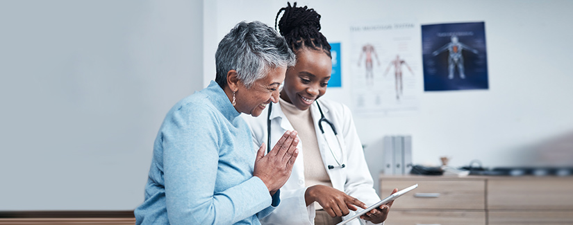 doctor and patient viewing results